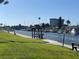 Relaxing waterfront view with lush landscaping and boats at 5123 Topaz Ln # 105, New Port Richey, FL 34652