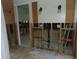 Bathroom under renovation, showing exposed plumbing and walls at 2044 Montana Ne Ave, St Petersburg, FL 33703