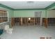Bathroom with damaged walls and flooring at 2044 Montana Ne Ave, St Petersburg, FL 33703