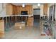 A kitchen needing renovation, with some existing cabinetry and appliances at 2044 Montana Ne Ave, St Petersburg, FL 33703