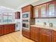 Kitchen with stainless appliances, granite countertops, and backyard view at 8726 Latham Drive, Hudson, FL 34667