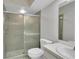Bathroom features a shower/tub combo and updated vanity at 4750 Carrington Ct, New Port Richey, FL 34655