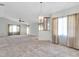 Spacious living room with high ceilings and large windows at 4750 Carrington Ct, New Port Richey, FL 34655