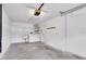 Spacious garage with washer, dryer, utility sink, and storage at 4750 Carrington Ct, New Port Richey, FL 34655