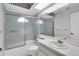 Updated bathroom with tub, shower, and single vanity at 4750 Carrington Ct, New Port Richey, FL 34655