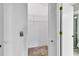Walk-in closet with wire shelving and bi-fold doors at 4750 Carrington Ct, New Port Richey, FL 34655