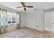 Bedroom with double closets and window coverings at 4750 Carrington Ct, New Port Richey, FL 34655