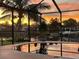 Sunset view from the screened pool and patio at 2044 Montana Ne Ave, St Petersburg, FL 33703