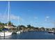 Scenic waterfront view with sailboats and lush tropical vegetation at 2044 Montana Ne Ave, St Petersburg, FL 33703