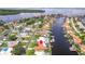 Aerial view showing home's location in a waterfront community with boat docks at 2044 Montana Ne Ave, St Petersburg, FL 33703