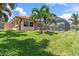 Landscaped backyard with pool and patio area at 2044 Montana Ne Ave, St Petersburg, FL 33703