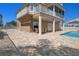 Large pool and spa with expansive paver patio and outdoor seating at 3448 Triggerfish Dr, Hernando Beach, FL 34607