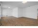 Finished basement with hardwood floors and recessed lighting at 3448 Triggerfish Dr, Hernando Beach, FL 34607