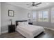 Spacious bedroom with queen bed, nightstands, and bay window at 3448 Triggerfish Dr, Hernando Beach, FL 34607