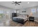 Bright bedroom with king bed, access to balcony and water views at 3448 Triggerfish Dr, Hernando Beach, FL 34607