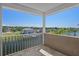 Relaxing balcony overlooking a lake and houses at 3448 Triggerfish Dr, Hernando Beach, FL 34607