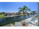 Private pool and canal views from this elevated vantage point at 3448 Triggerfish Dr, Hernando Beach, FL 34607