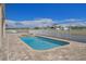 Inviting rectangular pool with spa and ample patio space at 3448 Triggerfish Dr, Hernando Beach, FL 34607