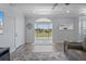 Living area with access to balcony and water views at 3448 Triggerfish Dr, Hernando Beach, FL 34607