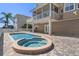 Inviting spa and rectangular pool with surrounding patio at 3448 Triggerfish Dr, Hernando Beach, FL 34607