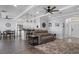 Open living room and kitchen with modern appliances and a coastal feel at 3448 Triggerfish Dr, Hernando Beach, FL 34607