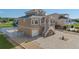 Two story waterfront home with attached two car garage and paver driveway at 3448 Triggerfish Dr, Hernando Beach, FL 34607