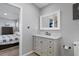 Modern bathroom with gray vanity and marble top at 3448 Triggerfish Dr, Hernando Beach, FL 34607