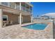 Large, refreshing pool with a spa and spacious patio at 3448 Triggerfish Dr, Hernando Beach, FL 34607