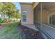 Home with screened patio and paved backyard patio at 1183 Mystic Ct, Spring Hill, FL 34609