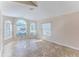 Sunroom with tile floors and arched windows offering natural light at 1183 Mystic Ct, Spring Hill, FL 34609