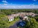 Community clubhouse and landscape at 1183 Mystic Ct, Spring Hill, FL 34609