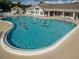 Community pool with people participating in water aerobics at 1183 Mystic Ct, Spring Hill, FL 34609