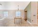 Dining area with tile floors and a bamboo table at 1183 Mystic Ct, Spring Hill, FL 34609