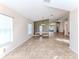 Spacious dining room with tile floors and access to the living area at 1183 Mystic Ct, Spring Hill, FL 34609