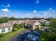 Community clubhouse and surrounding landscape at 1183 Mystic Ct, Spring Hill, FL 34609