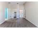 Bright bedroom with neutral walls, carpeted floors, and walk-in closet at 1183 Mystic Ct, Spring Hill, FL 34609