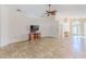 Living area features tile floors and a view of the front entryway at 1183 Mystic Ct, Spring Hill, FL 34609