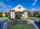 Community clubhouse with manicured landscaping and inviting entrance at 1183 Mystic Ct, Spring Hill, FL 34609
