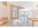Bright living room with tile floors and large windows at 1183 Mystic Ct, Spring Hill, FL 34609