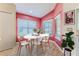 Modern breakfast nook with white table and chairs, great for Gathering meals at 1183 Mystic Ct, Spring Hill, FL 34609