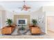 Living room boasts a modern aesthetic with leather couches and large TV at 1183 Mystic Ct, Spring Hill, FL 34609