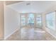 Sunroom with tile floors and arched windows offering natural light at 1183 Mystic Ct, Spring Hill, FL 34609