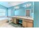 Bathroom with double vanity, soaking tub, and tile flooring at 1183 Mystic Ct, Spring Hill, FL 34609