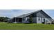 House exterior showcasing a gray and white color scheme at 4201 Avanti Cir, New Port Richey, FL 34655