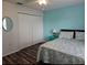 Serene bedroom with queen-size bed and built-in closet at 4201 Avanti Cir, New Port Richey, FL 34655