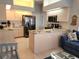 Modern kitchen with granite countertops, stainless steel appliances, and island at 4201 Avanti Cir, New Port Richey, FL 34655