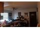 Cluttered living room with a ceiling fan and various items at 3310 68Th N Ave, St Petersburg, FL 33702