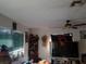 Living room with ceiling fan and window coverings at 3310 68Th N Ave, St Petersburg, FL 33702