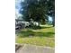 House exterior showcasing a camper and other items in the yard at 3310 68Th N Ave, St Petersburg, FL 33702