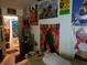 Bedroom with posters, a bed, and access to a bathroom at 3310 68Th N Ave, St Petersburg, FL 33702